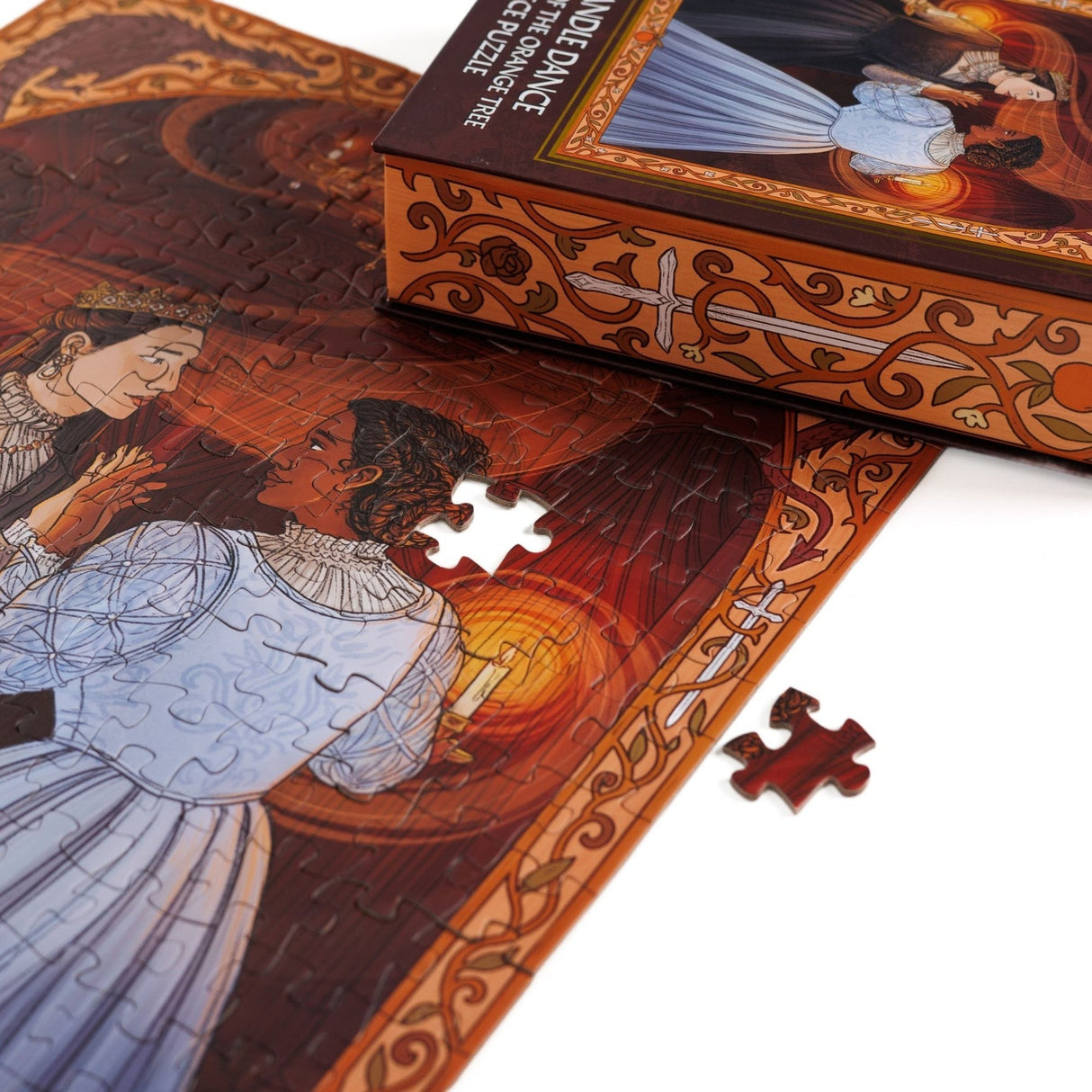 Kingdom of Threads: The Candle Dance Keepsake Puzzle | Priory of the Orange Tree - 250 Pieces