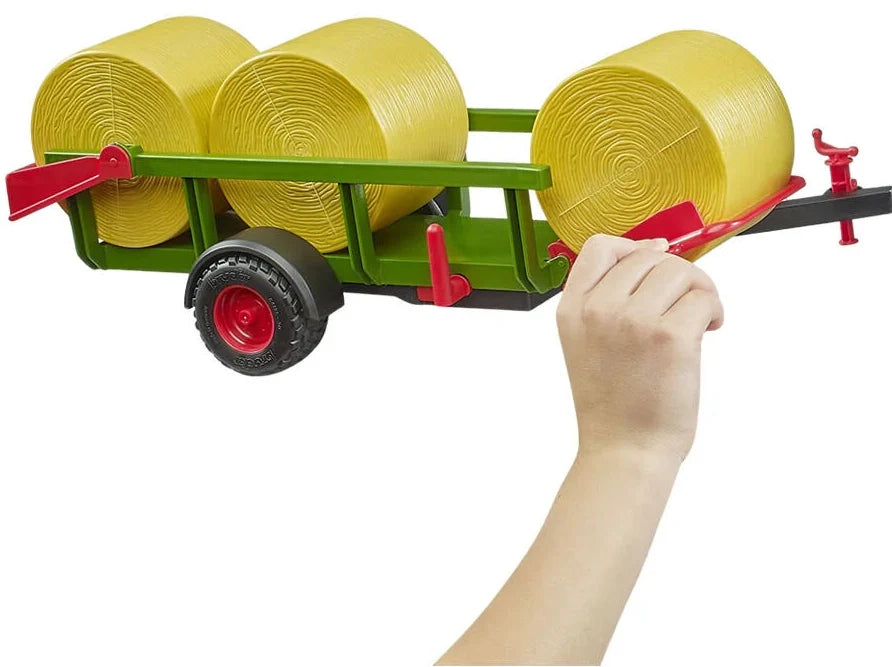 Bruder: Self Loading Bale Trailer & Bales