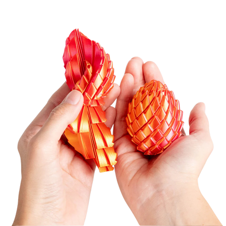 Turtle Creations: Twisty Dragon Egg Fidget Toy - Red & Gold